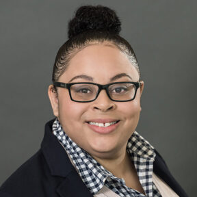 Alexandria smiles in her headshot.