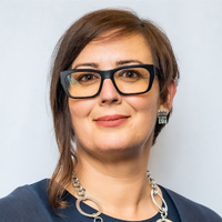 Davis smiles in her headshot.