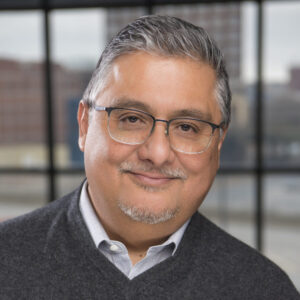 Diaz_Eusebio 2023 Eusebio smiles in his headshot.