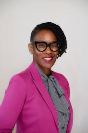 Dr. Yanique Redwood smiles in a headshot photo.