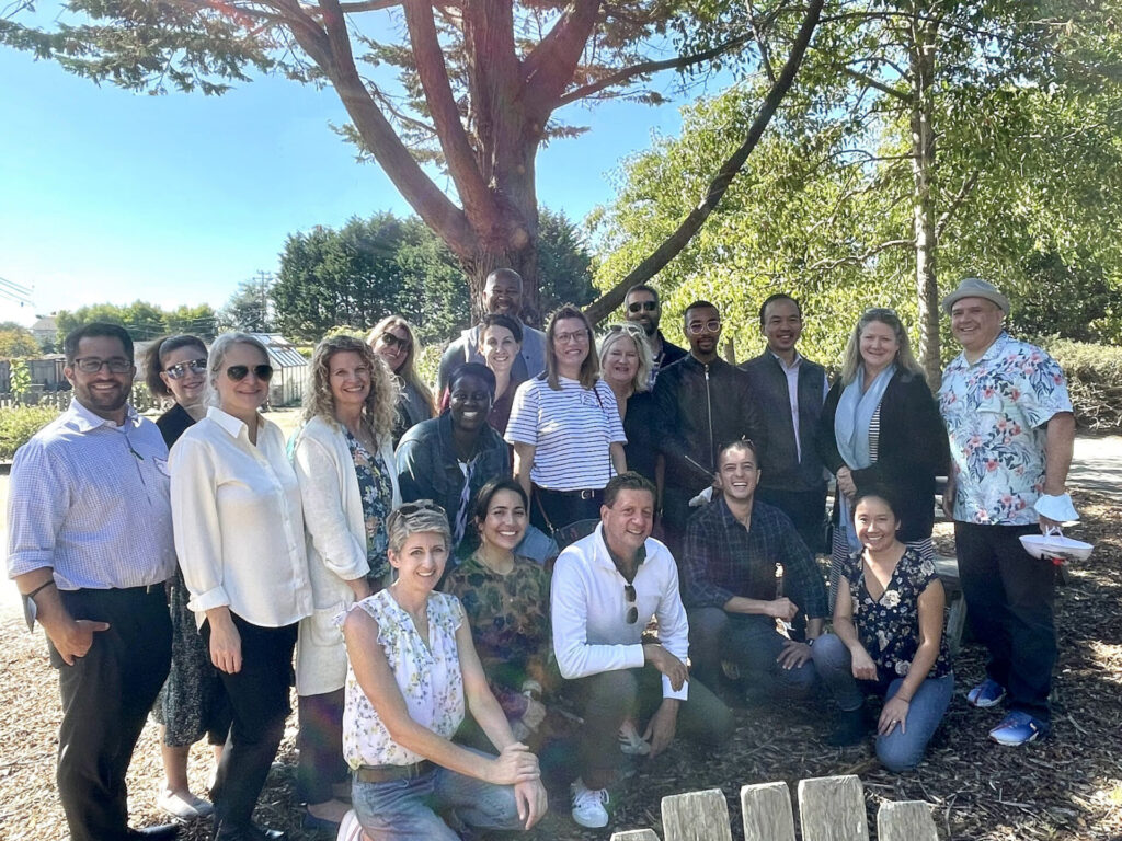 Grant Management Directors Circle group photo under a tree