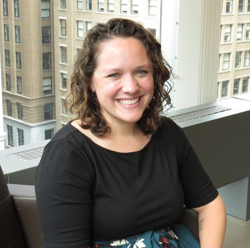 Kimberly smiles in her headshot