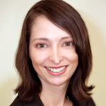 Janet smiles in her headshot