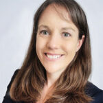 Lauren smiles in her headshot.