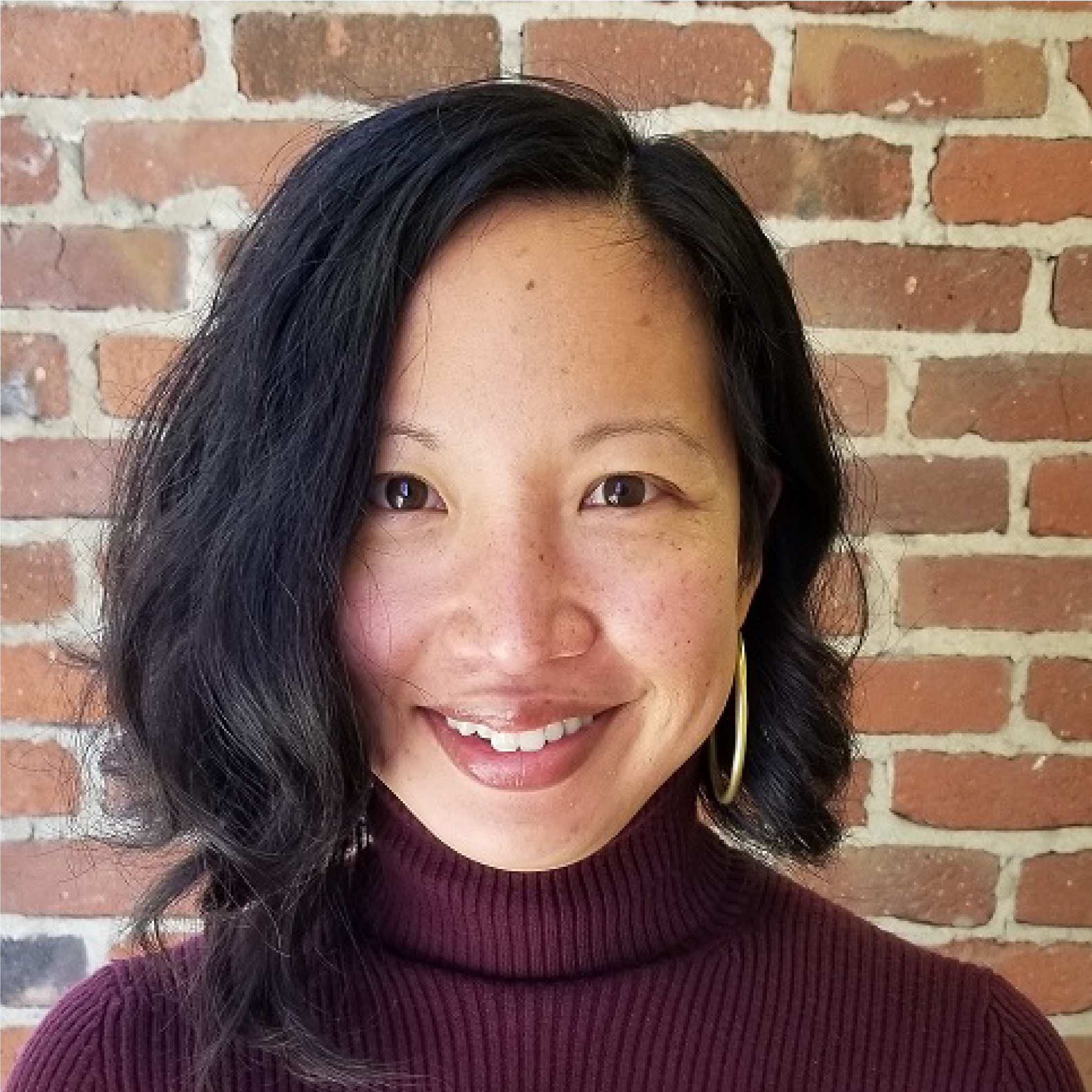 Pui Ling Tam smiles in her headshot